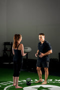 Colin coaching a participant on movement technique