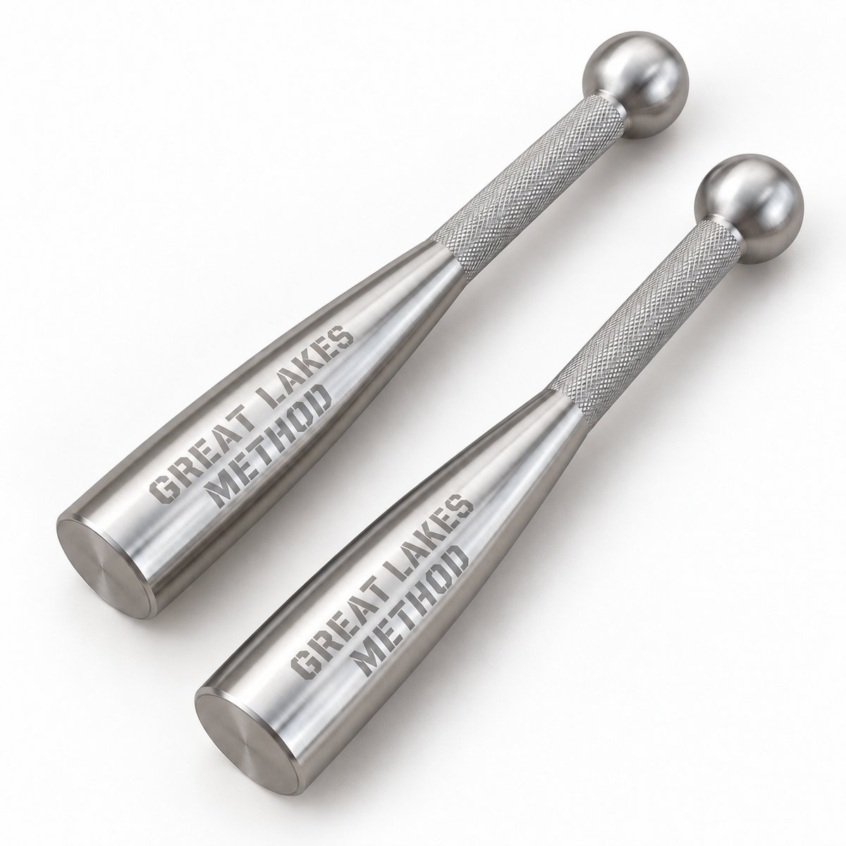 Pair of Great Lakes Method 304 stainless steel clubs with knurled grips on a white background